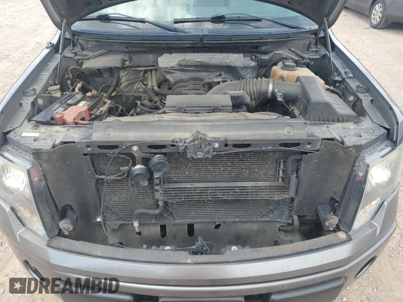 2011 Ford F-150 XL z VIN 1FTFW1EF7BFD40712, wystawiony jako Copart lot #60809695 z przebiegiem 210 076 mil mil oraz Szkoda całkowita • Salvage title. Historia ofert i sprzedaży dostępna na DreamBid. Obrazek 11.