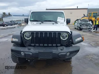 2022 Jeep Wrangler Unlimited Sport S with VIN 1C4HJXDG3NW155467, listed as a IAAI auction lot 41638650 with 22,698 mi miles and . Bid and sale history available at DreamBid. Image 12.