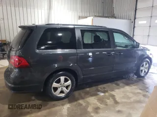 2011 Volkswagen Routan SE with VIN 2V4RW3DG2BR738704, listed as a Copart auction lot 58767625 with 116,886 mi miles and Salvage title. Bid and sale history available at DreamBid. Image 3.