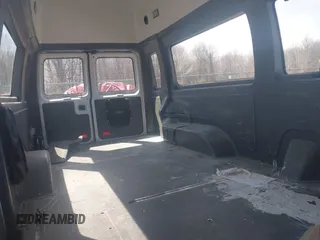 2014 Ford Econoline Cargo Commercial with VIN 1FTNS2EW7EDA67834, listed as a IAAI auction lot 42026939 with 138,501 mi miles. Bid and sale history available at carsss.com. Image 8.