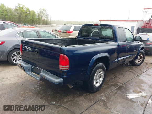 2002 Dodge Dakota Sport with VIN 1B7GL32X12S561414, listed as a IAAI auction lot 42060300 with 235,957 mi miles. Bid and sale history available at carsss.com. Image 4.