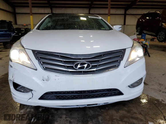 2013 Hyundai Azera z VIN KMHFH4JG0DA225049, wystawiony jako Copart lot #65530604 z przebiegiem 77 218 mil mil oraz Szkoda całkowita • Salvage title. Historia ofert i sprzedaży dostępna na DreamBid. Obrazek 5.