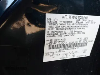 2015 Ford Taurus Limited with VIN 1FAHP2F8XFG135452, listed as a IAAI auction lot 42003510 with 71,476 mi miles. Bid and sale history available at carsss.com. Image 9.