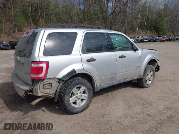 2010 Ford Escape Hybrid z VIN 1FMCU5K33AKC89835, wystawiony jako IAAI lot #41915349 z przebiegiem 125 659 mil mil oraz . Historia ofert i sprzedaży dostępna na DreamBid. Obrazek 4.