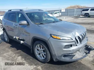 2016 Jeep Cherokee Latitude with VIN 1C4PJMCS4GW194491, listed as a IAAI auction lot 41758324 with 142,233 mi miles. Bid and sale history available at carsss.com. Image 1.