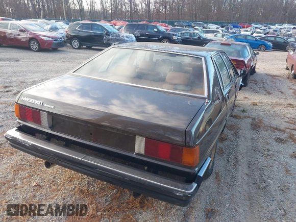 1982 Maserati Quattroporte z VIN ZAMBC1102CA301920, wystawiony jako IAAI lot #41297603 z przebiegiem 62 287 mil mil oraz . Historia ofert i sprzedaży dostępna na DreamBid. Obrazek 4.