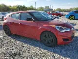 2014 Hyundai Veloster z VIN KMHTC6AD8EU213234, wystawiony jako Copart lot #53297535 z przebiegiem 131 769 mil mil oraz Szkoda całkowita • Salvage title. Historia ofert i sprzedaży dostępna na DreamBid. Obrazek 4.