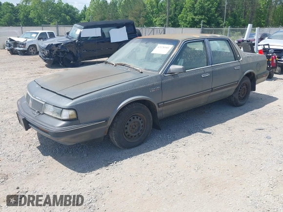 1989 Oldsmobile Cutlass Ciera with VIN 2G3AJ51NXK2439345, listed as a IAAI auction lot 42128301 with 241,434 mi miles and . Bid and sale history available at DreamBid. Image 2.