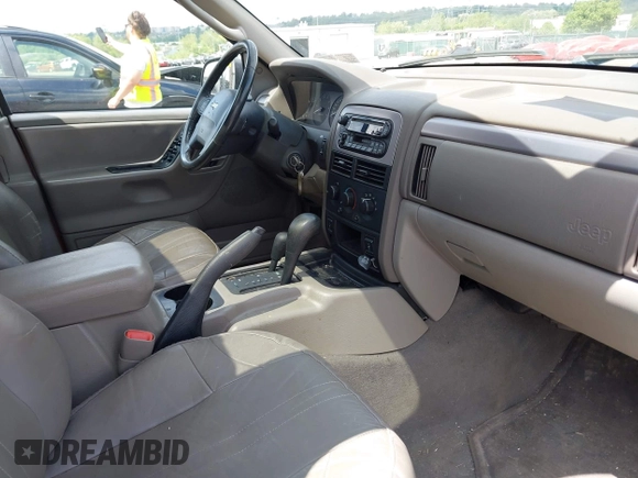 2004 Jeep Grand Cherokee Laredo z VIN 1J8GW48S24C400424, wystawiony jako IAAI lot #42215397 z przebiegiem 122 246 mil mil oraz . Historia ofert i sprzedaży dostępna na DreamBid. Obrazek 5.