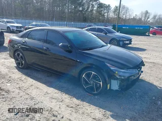 2023 Hyundai Elantra N Line z VIN KMHLR4AF9PU609633, wystawiony jako IAAI lot #41758887 z przebiegiem 24 000 mil mil oraz . Historia ofert i sprzedaży dostępna na DreamBid. Obrazek 1.