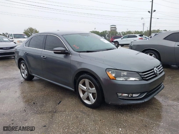 2015 Volkswagen Passat 1.8T Limited Edition with VIN 1VWAT7A34FC089282, listed as a IAAI auction lot 41767239 with 68,156 mi miles. Bid and sale history available at carsss.com. Image 1.
