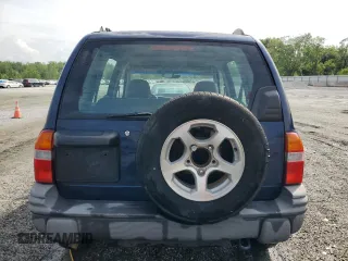 2002 Chevrolet Tracker ZR2 z VIN 2CNBJ734426936514, wystawiony jako Copart lot #54051825 z przebiegiem 229 668 mil mil oraz Szkoda całkowita • Salvage title. Historia ofert i sprzedaży dostępna na DreamBid. Obrazek 6.