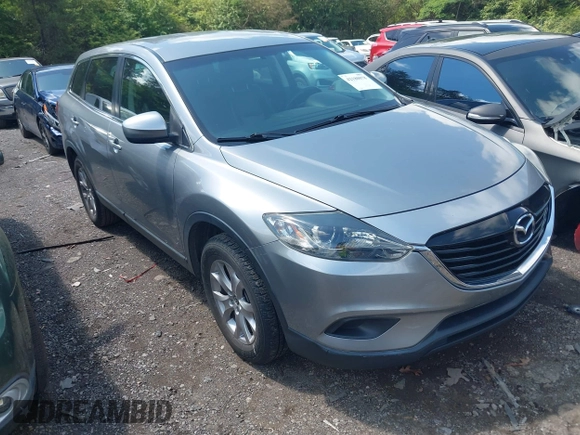 2015 Mazda CX-9 Touring with VIN JM3TB2CA2F0451180, listed as a IAAI auction lot 42180078 with 112,804 mi miles and . Bid and sale history available at carsss.com. Image 1.