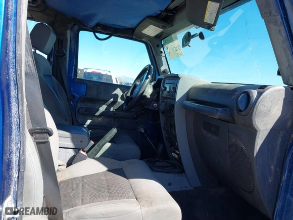 2010 Jeep Wrangler Unlimited Sport with VIN 1J4BA3H19AL197779, listed as a IAAI auction lot 41620455 with 161,697 mi miles. Bid and sale history available at carsss.com. Image 5.
