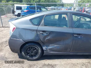 2014 Toyota Prius Four z VIN JTDKN3DU5E0363524, wystawiony jako IAAI lot #42540771 z przebiegiem 113 697 mil mil oraz . Historia ofert i sprzedaży dostępna na DreamBid. Obrazek 6.