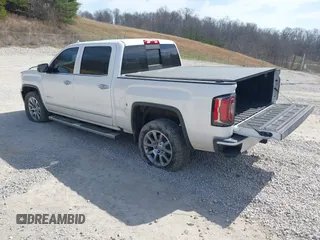 2017 GMC Sierra 1500 Denali with VIN 3GTU2PEC5HG164021, listed as a IAAI auction lot 41784101 with 69,167 mi miles and . Bid and sale history available at DreamBid. Image 3.