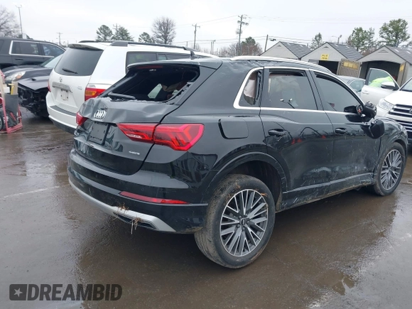 2021 Audi Q3 Premium with VIN WA1AUCF31M1131914, listed as a IAAI auction lot 41571543 with 35,477 mi miles and . Bid and sale history available at DreamBid. Image 4.