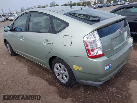 2006 Toyota Prius z VIN JTDKB20U963131145, wystawiony jako IAAI lot #41857847 z przebiegiem 113 251 mil mil oraz . Historia ofert i sprzedaży dostępna na DreamBid. Obrazek 3.