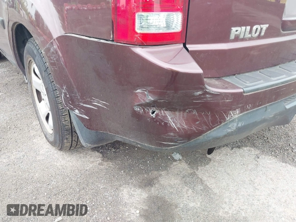 2013 Honda Pilot LX with VIN 5FNYF4H25DB029032, listed as a IAAI auction lot 42661736 with 128,096 mi miles and . Bid and sale history available at DreamBid. Image 17.