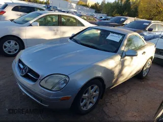 1998 Mercedes-Benz SLK 230/320 with VIN WDBKK47F8WF008582, listed as a IAAI auction lot 41958516 with 137,130 mi miles and . Bid and sale history available at DreamBid. Image 2.