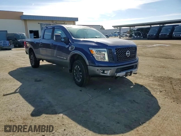 2016 Nissan Titan XD PRO-4X with VIN 1N6BA1F42GN509751, listed as a Copart auction lot 80576664 with 79,037 mi miles and Salvage Title. Bid and sale history available at carsss.com. Image 11.