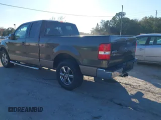 2008 Ford F-150 STX with VIN 1FTRX12W38KB20188, listed as a IAAI auction lot 40991123 with 184,738 mi miles and . Bid and sale history available at carsss.com. Image 3.