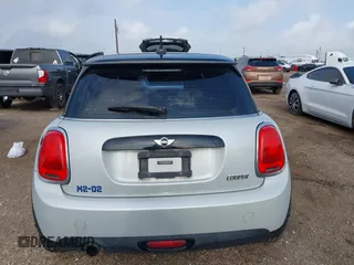 2017 MINI Hardtop Cooper z VIN WMWXP5C35H3C64595, wystawiony jako IAAI lot #42078919 z przebiegiem 93 141 mil mil oraz . Historia ofert i sprzedaży dostępna na DreamBid. Obrazek 16.