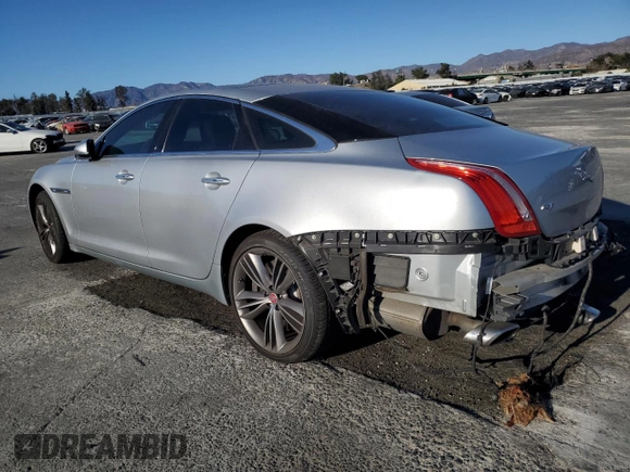 2011 Jaguar XJ with VIN SAJWA1JC0BMV13347, listed as a Copart auction lot 87699375 with Not Provided miles and Salvage Title. Bid and sale history available at DreamBid. Image 2.