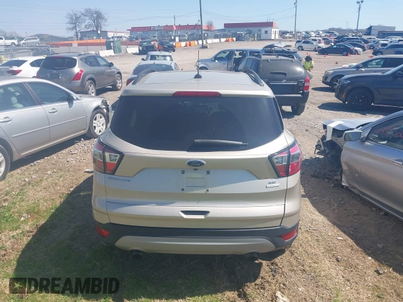 2017 Ford Escape SE with VIN 1FMCU0GD3HUC94245, listed as a IAAI auction lot 41877799 with 214,571 mi miles. Bid and sale history available at carsss.com. Image 16.