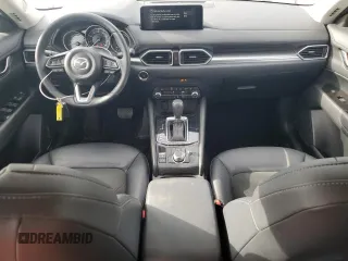2021 Mazda CX-5 Touring with VIN JM3KFACM2M0451083, listed as a Copart auction lot 49999935 with 59,927 mi miles and Salvage Title. Bid and sale history available at carsss.com. Image 8.