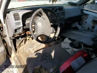 1998 Nissan Frontier XE with VIN 1N6DD21S9WC357098, listed as a Copart auction lot 77652604 with Not provided miles and Clean title. Bid and sale history available at DreamBid. Image 8.