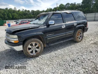 2003 Chevrolet Tahoe LS with VIN 1GNEC13Z73J148021, listed as a Copart auction lot 60900145 with Not provided miles and Non repairable. Bid and sale history available at DreamBid. Image 1.