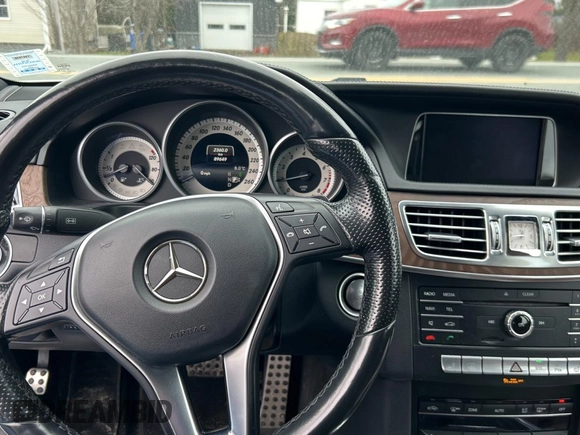 2016 Mercedes-Benz E-Class E 400 with VIN WDDHF6HB4GB200197, listed as a Copart auction lot 82809674 with 89,649 mi miles and Clean Title. Bid and sale history available at carsss.com. Image 9.