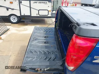 2003 Chevrolet Avalanche z VIN 3GNEC13T93G317713, wystawiony jako IAAI lot #41914946 z przebiegiem Nie podano mil oraz . Historia ofert i sprzedaży dostępna na DreamBid. Obrazek 6.