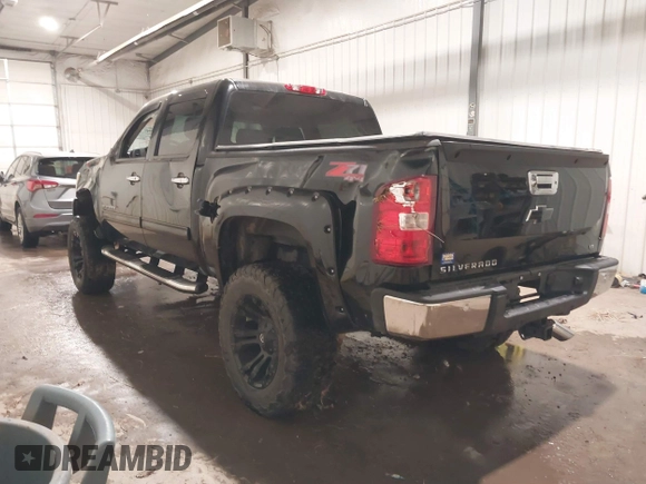 2013 Chevrolet Silverado 1500 LT with VIN 3GCPKSE75DG238194, listed as a IAAI auction lot 40997920 with 163,303 mi miles. Bid and sale history available at carsss.com. Image 3.
