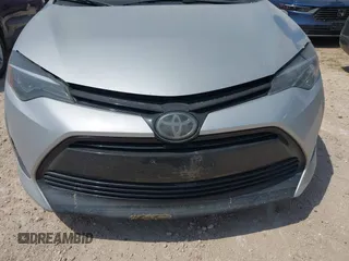 2018 Toyota Corolla L with VIN 2T1BURHE1JC986244, listed as a IAAI auction lot 41942626 with Not provided miles and . Bid and sale history available at DreamBid. Image 6.