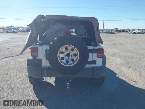 2010 Jeep Wrangler Mountain with VIN 1J4AA2D14AL173286, listed as a IAAI auction lot 41661821 with Not Provided miles and . Bid and sale history available at carsss.com. Image 16.