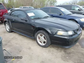2000 Ford Mustang with VIN 1FAFP4049YF306239, listed as a IAAI auction lot 41940571 with 130,569 mi miles. Bid and sale history available at carsss.com. Image 1.