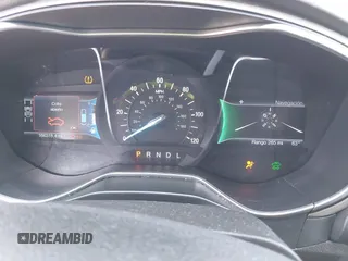 2016 Ford Fusion Energi SE Luxury with VIN 3FA6P0PU8GR273122, listed as a IAAI auction lot 42062083 with 166,318 mi miles. Bid and sale history available at carsss.com. Image 7.