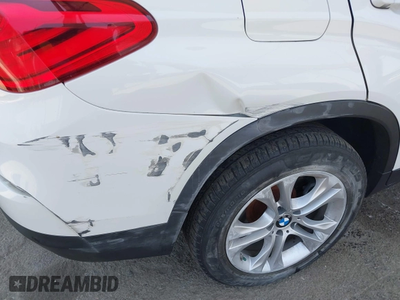2015 BMW X4 xDrive28i with VIN 5UXXW3C5XF0M89259, listed as a IAAI auction lot 42553903 with 98,960 mi miles and . Bid and sale history available at DreamBid. Image 17.