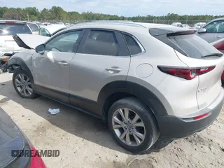2023 Mazda CX-30 S Select with VIN 3MVDMBBM6PM518380, listed as a IAAI auction lot 40720006 with 13,422 mi miles and . Bid and sale history available at DreamBid. Image 3.