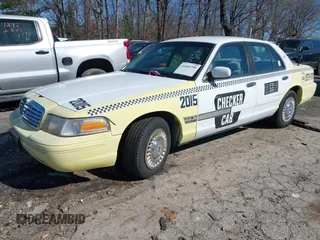 1999 Ford Crown Victoria Police with VIN 2FAFP71WXXX239705, listed as a IAAI auction lot 41601390 with 161,454 mi miles. Bid and sale history available at carsss.com. Image 2.