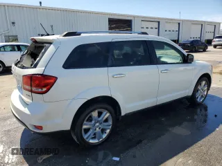 2012 Dodge Journey Crew with VIN 3C4PDCDGXCT146909, listed as a Copart auction lot 49216555 with 161,436 mi miles and Salvage title. Bid and sale history available at DreamBid. Image 3.