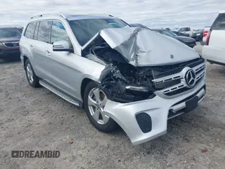 2019 Mercedes-Benz GLS with VIN 4JGDF6EE3KB233199, listed as a IAAI auction lot 41709658 with 89,471 mi miles. Bid and sale history available at carsss.com. Image 1.