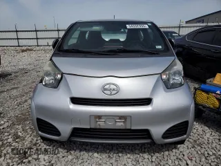 2012 Scion iQ with VIN JTNJJXB03CJ015321, listed as a Copart auction lot 54332355 with 63,439 mi miles and Salvage title. Bid and sale history available at DreamBid. Image 5.