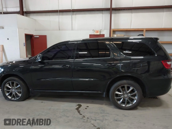2015 Dodge Durango Limited with VIN 1C4RDJDG8FC904890, listed as a IAAI auction lot 42390110 with 159,971 mi miles and . Bid and sale history available at DreamBid. Image 15.