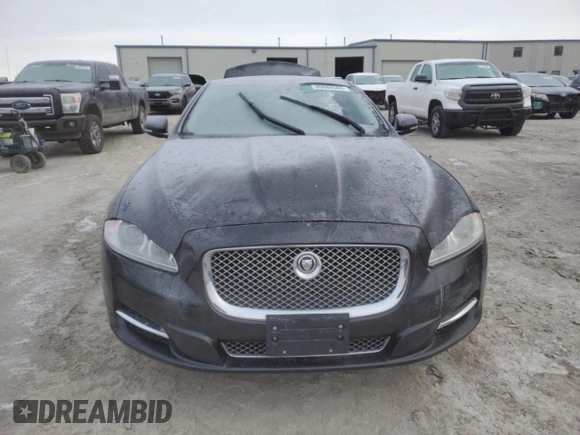 2013 Jaguar XJ with VIN SAJWA1C70D8V41578, listed as a Copart auction lot 89080585 with 76,063 mi miles and Salvage Title. Bid and sale history available at DreamBid. Image 5.