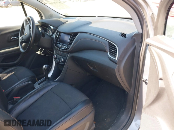 2020 Chevrolet Trax LT with VIN 3GNCJLSBXLL322296, listed as a IAAI auction lot 42030809 with 51,367 mi miles and . Bid and sale history available at DreamBid. Image 5.