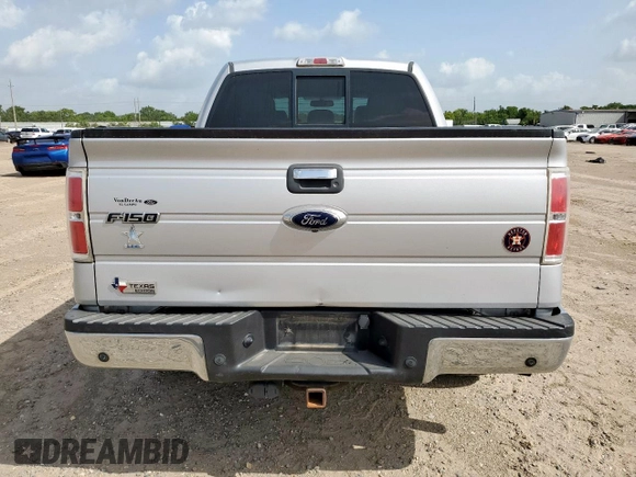 2014 Ford F-150 XL with VIN 1FTFW1ET0EKG04449, listed as a Copart auction lot 62642725 with 223,472 mi miles and Salvage title. Bid and sale history available at DreamBid. Image 6.