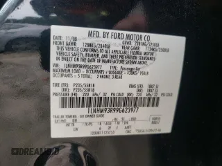 2009 Lincoln MKS with VIN 1LNHM93R99G623977, listed as a Copart auction lot 63463285 with 206,359 mi miles and Salvage title. Bid and sale history available at DreamBid. Image 12.